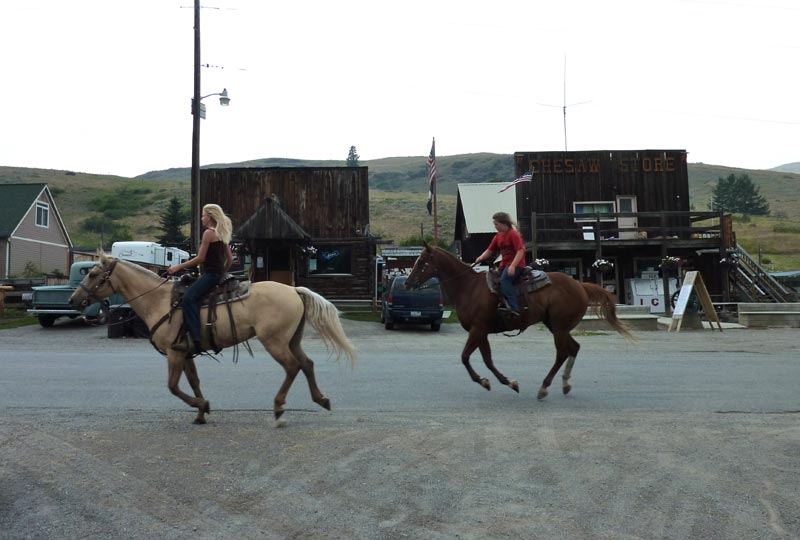 girls riding horses